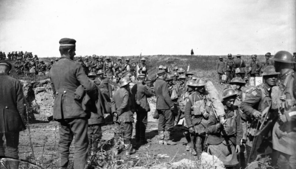 244_German prisoners watching Canadian Highlanders going into fight. Advance East of Arras. October, 1918
